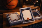 Basketball trading cards from a collection, photographed on a collector's desk